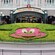 The entrance to Disneyland Paris featuring a floral and greenery display shaped like Mickey Mouse